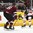 TORONTO, CANADA - DECEMBER 29:  Canada's Kale Clague #10 passes the puck up ice past Latvia's Emils Ezitis #26 during preliminary round action at the 2017 IIHF World Junior Championship. (Photo by Matt Zambonin/HHOF-IIHF Images)

